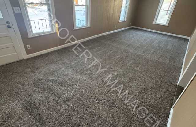 Photo of Charming 2-Bedroom Home with Bonus Room, Spacious Kitchen  Great Outdoor Space