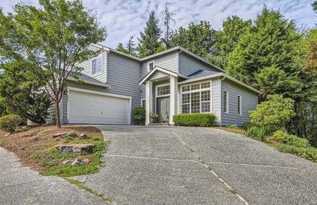 Photo of Spacious 4-Bedroom Home in Kenmore | Private Greenbelt Setting + Landscaping Included