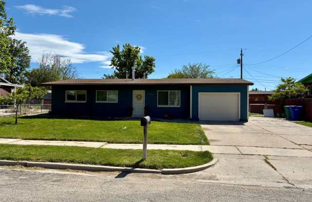 Beautifully remodeled home with central air, 1 car garage, RV parking and covered patio