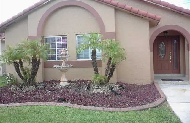 7635 NW 168th Ter - 7635 Northwest 168th Terrace, Country Club, FL 33015