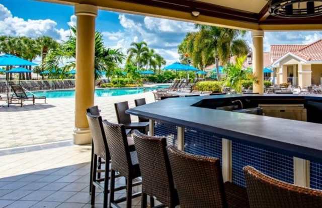 ** Calling all Golf Enthusiasts ** Turn-Key 2 Bedroom + Den | 2 Bath Condo with Golf Course  Water View in Naples' Prestigious Vanderbilt Country Club