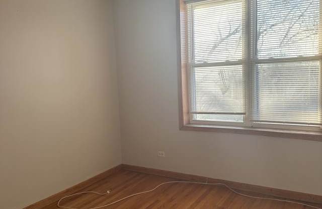 7933 South Langley Ave.