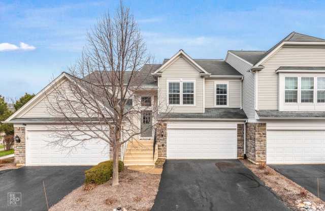 AUTUMN CREEK SECOND FLOOR CONDO WITH TWO CAR GARAGE