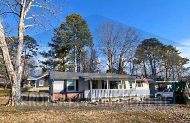 Charming 3-Bedroom Home with Unique Layout  Spacious Back Deck!