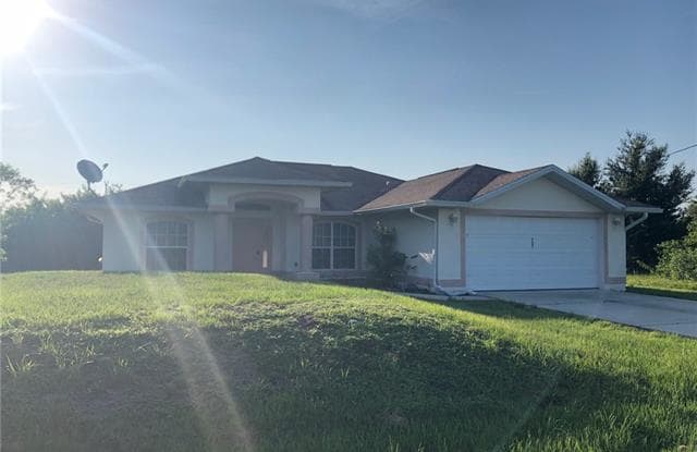 507 Carrillon AVE S - 507 Carrillon Avenue South, Lehigh Acres, FL 33974