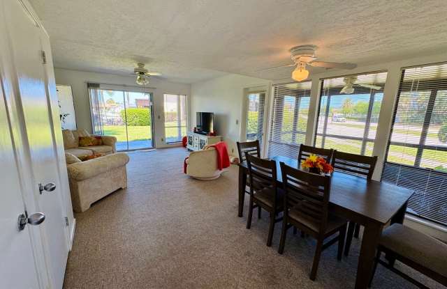 FULLY FURNISHED 2-Story Townhouse on Canal – Pool, Golf Views & ALL Utilities Included!
