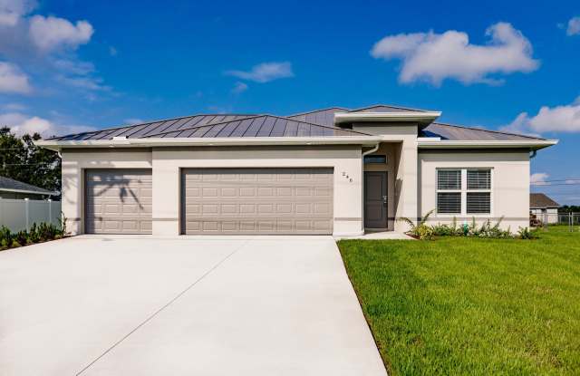 Brand-New Corner Lot Home with 3-Car Garage in Cape Coral!