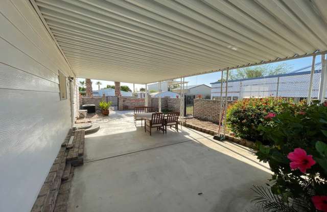 Partially Furnished Manufactured Home on its own Large Corner Lot! *No HOA*