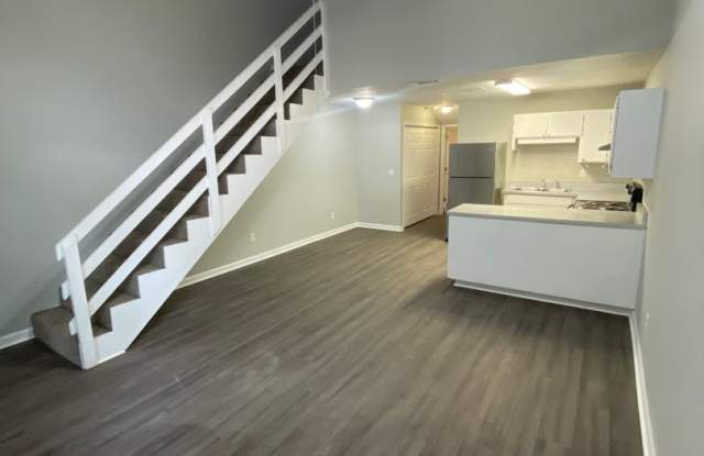 Photo of Freshly Remodeled 2 BR 2 BA Townhome Available Now! Beautiful New Flooring, Paint, And More!