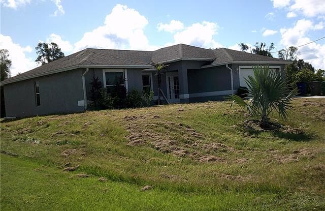 395 Palomar AVE - 395 Palomar Avenue, Lehigh Acres, FL 33974