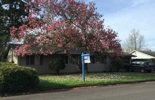 Well-Located Home with Fireplace, Fenced Yard & 2-Car Garage