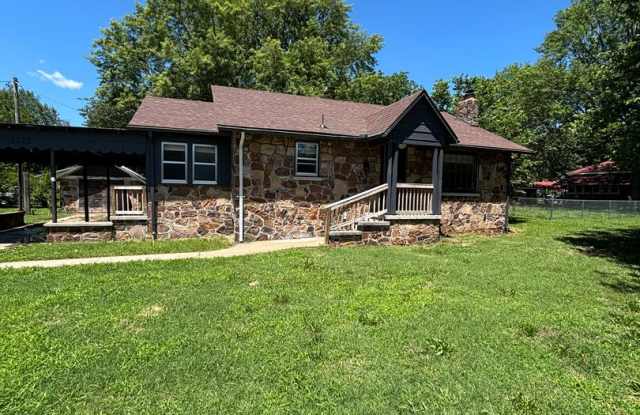 Charming 3-Bedroom Stone Home with Spacious Yard