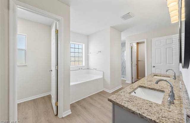 4BR Home in Gated Town Lakes Community with Lake View