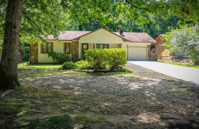 Two Bedroom, 2 Bath, 1-Car Garage, 1179 sq ft feet home with wood burning fireplace, double oven in kitchen and a screened porch.
