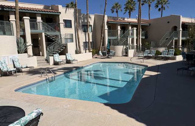 East side condo with community pool/spa/assigned covered parking place