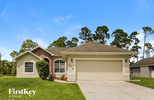 715 Foxtail Street East - 715 Foxtail St E, Lehigh Acres, FL 33974