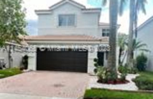 1064 Golden Cane Dr - 1064 Golden Cane Drive, Weston, FL 33327