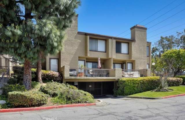 Plenty of Natural Light! Spacious Townhouse conveniently across Dominguez Hills!