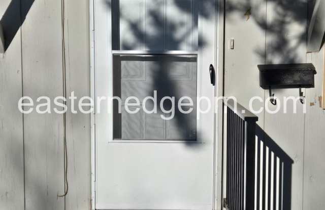 Beautifully Updated Apartment with Modern Finishes, Private Yard & Convenient Location