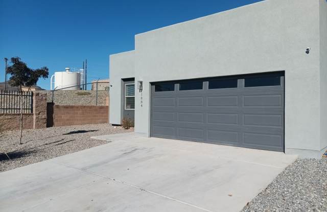 Newly-renovated 3 bedroom, 2 bathroom in Los Lunas! All new appliances! HUGE yard! Showings available NOW!