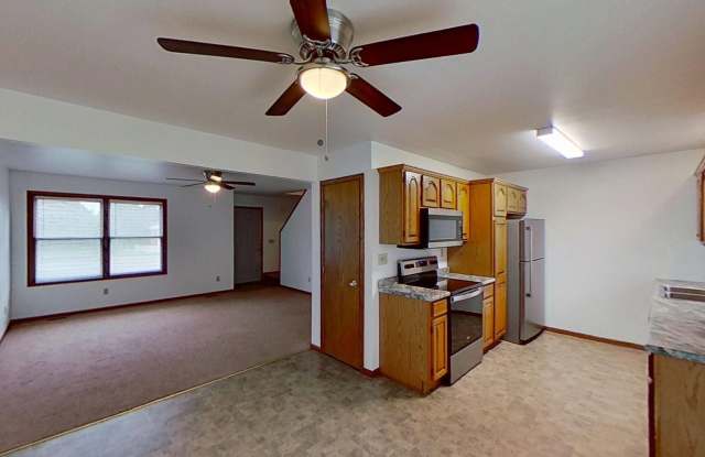 Duplex with two large bedrooms, walk in closet, 1.5 bath, full basement, lawn and snow removal included.