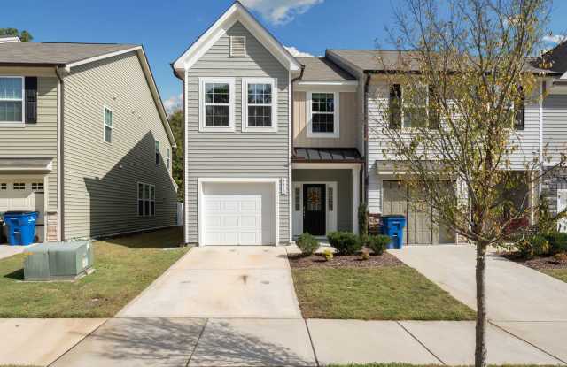Photo of Stylish and Spacious 3 Bedroom, 2.5 Bathroom End-Unit Townhome w/ Garage!