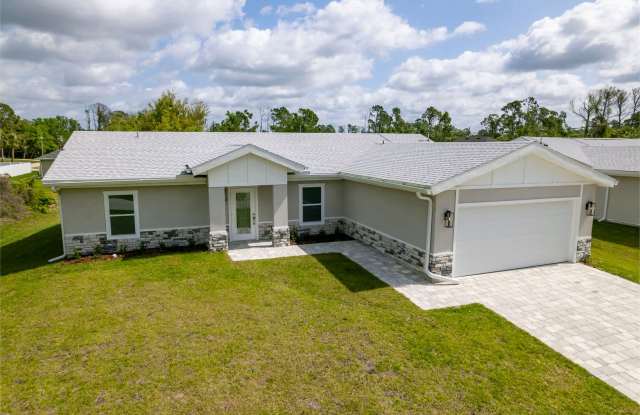 North Port Florida_Brand New Home with SOLAR PANELS and water filtration system! 3 bed / office / 2 car garage! - 2216 Kadlic Street, North Port, FL 34288