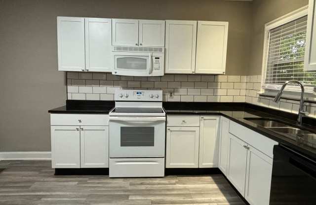 Photo of 3-Bed, 1-Bath Home – Fenced Yard, Off-Street Parking, Spacious Kitchen  In-Unit Laundry