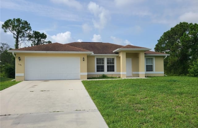 1146 Venetia Street E - 1146 Venetia Street, Lehigh Acres, FL 33974