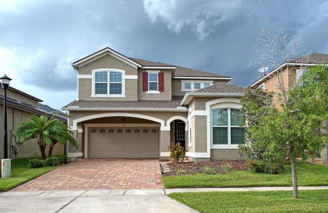 Photo of Beautiful 4 bed 3 bath w/loft, 2 story home, in the highly desired gated community of Tapestry in Kissimmee, FL.