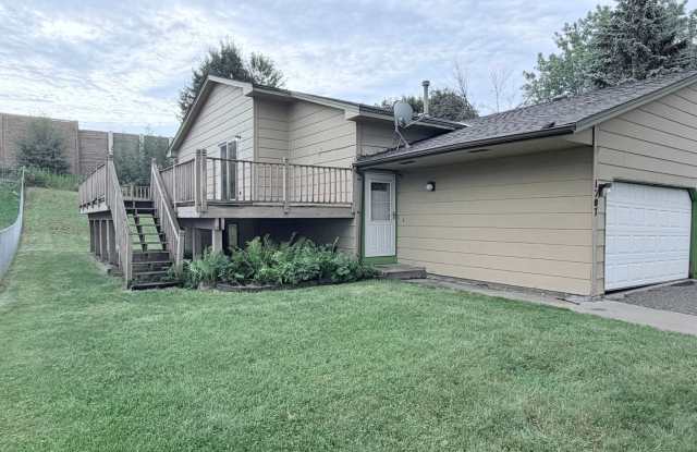 Versatile Oakdale Home Featuring 2 Kitchens, Sun Deck & Mother-in-Law Suite!