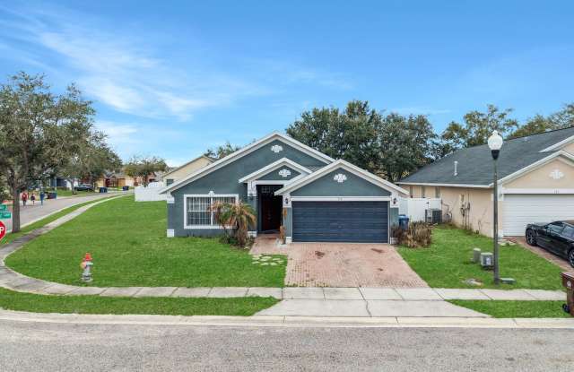 Spacious 4 Bedroom Home on Corner Lot with Designer Upgrades – Prime Haines City Location