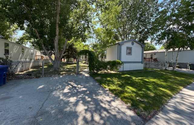 3 Bed 2 Bath Mobile Home with Fenced Yard and Storage Shed