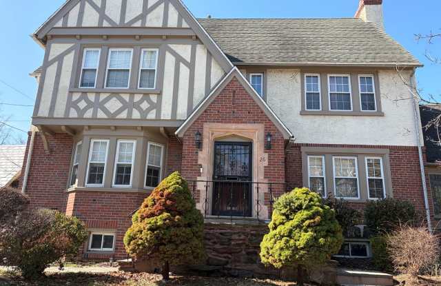 Elegant 3 Story Brick Corner Property Now Available