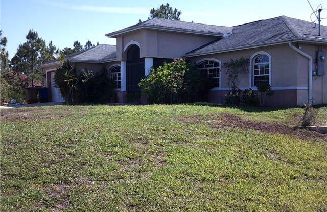 918 Plumosa AVE - 918 Plumosa Avenue, Lehigh Acres, FL 33972