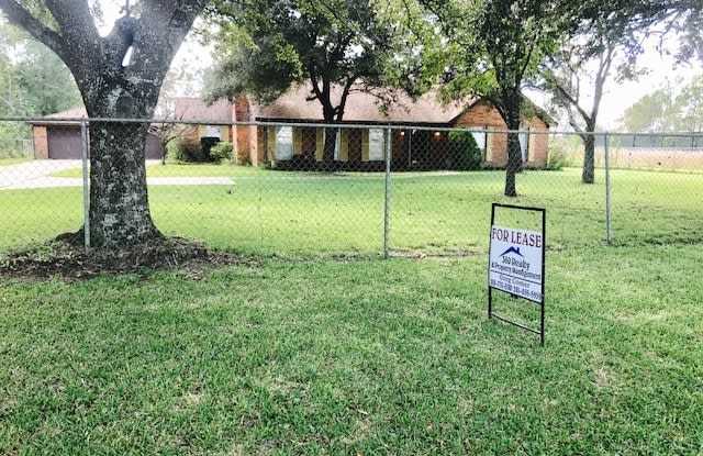 BIG 1 ACRE LOT HOME. HUGE MASTER BEDROOM OPEN FLOOR PLAN WITH 3 CAR GARAGE. - 8349 Farm to Market 1960 Road East, Liberty County, TX 77535