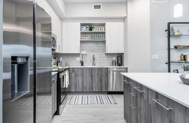 9375 W COMMERCIAL BLVD