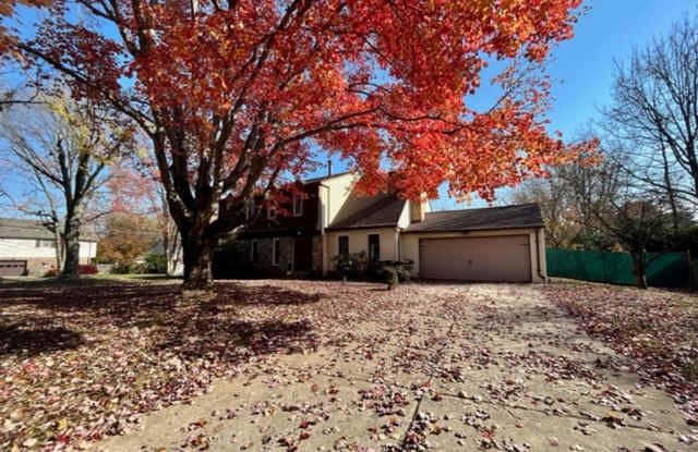 Beautiful and updated 4 BR 2.5 BA with garage and lovely yard!