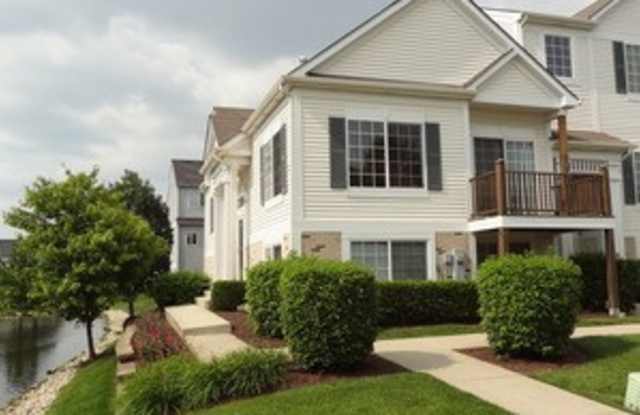 Beautiful & Very Spacious End Unit 2 bedroom  2 car garage. Must See.