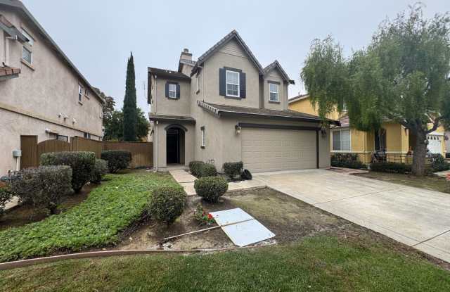 Photo of Great 5 bedroom 2.5 bath home in desirable Brentwood neighborhood! Crown molding in living room with gas fireplace. All new flooring, and new interior  exterior paint throughout. Come make this your next home!