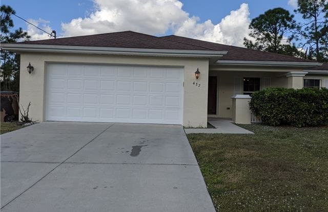 437 Broadmoor ST - 437 Broadmoor Street, Lehigh Acres, FL 33974