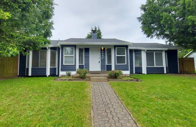 Photo of Auburn retro rambler home - 3 bedrooms and 2 bathrooms with 2 car detached garage and fenced yard - Available 7/10/25