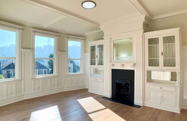 Photo of BEAUTIFUL RENOVATION! 4BR/3BA. In Unit Laundry! Dishwasher! Bay Windows!