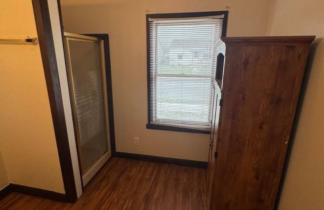 Beech Grove Downtown 3 BR/2BA single family home for rent, large deck and fenced yard with livable extra room in basement.