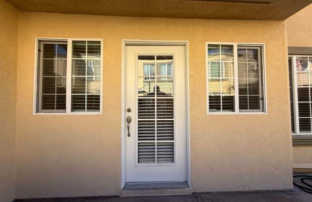 Upgraded Condo with Private Patio, AC, Pool, Gym, and Covered Parking in Gated Community