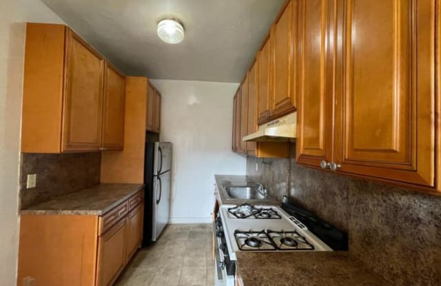 76-09 34TH AVE. - 76-09 34th Avenue, Queens, NY 11372