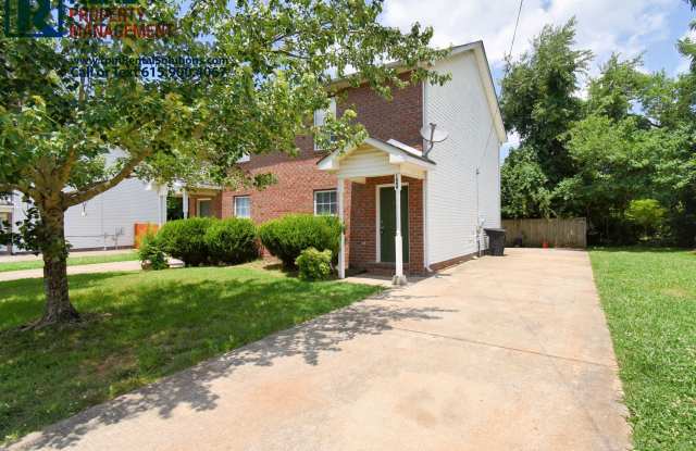 Photo of 2 Story Brick Duplex- Walk to MTSU! All fresh paint and flooring, washer  dryer  lawncare included!