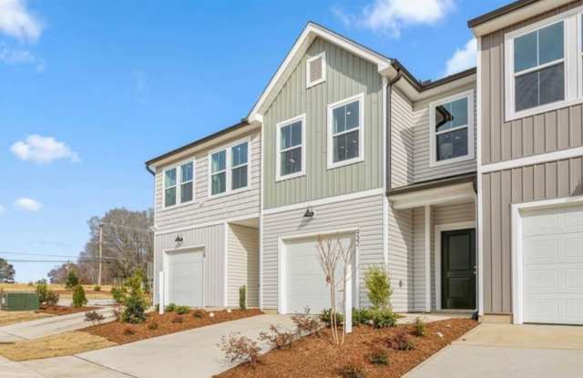 Photo of !!Get $500 OFF on 2nd mo rent!! Stunning New Build 3BA 2BR w/ Granite Kitchen • Garage • Wooded View in Falls Grove
