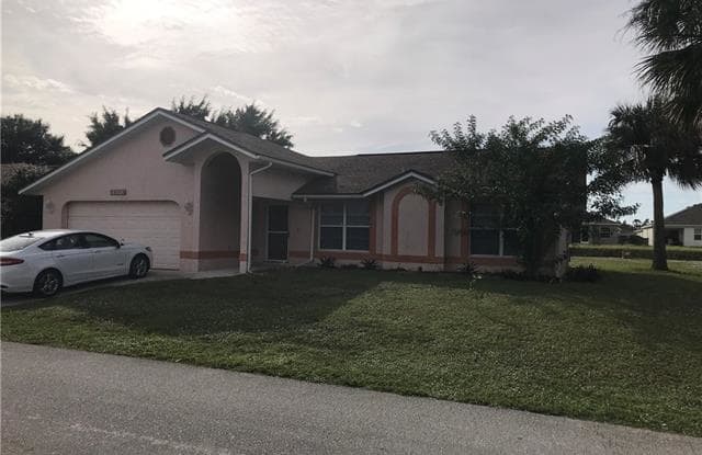 19482 Poppytree CT - 19482 Poppytree Court, Lehigh Acres, FL 33936