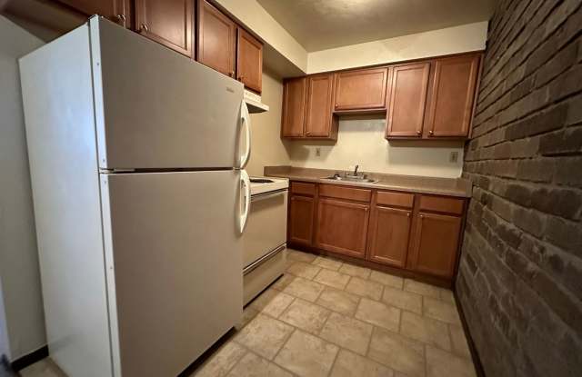 Cozy One Bedroom in Plum! Exposed Brick, On-Site Laundry & More! Call Today!